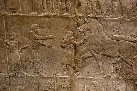 Artistic Assyrian lion-hunt bas-relief showing royal hunters, horses and lions, rendered as an HD PC desktop wallpaper and background.