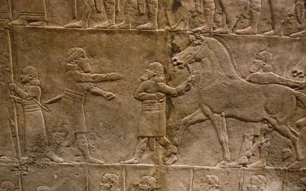 Artistic Assyrian lion-hunt bas-relief showing royal hunters, horses and lions, rendered as an HD PC desktop wallpaper and background.