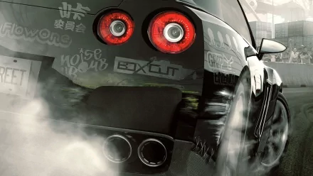 A dynamic HD wallpaper featuring a sleek car from the video game Need for Speed: ProStreet, with intense detailing and smoke billowing from the tires, capturing high-speed racing energy.
