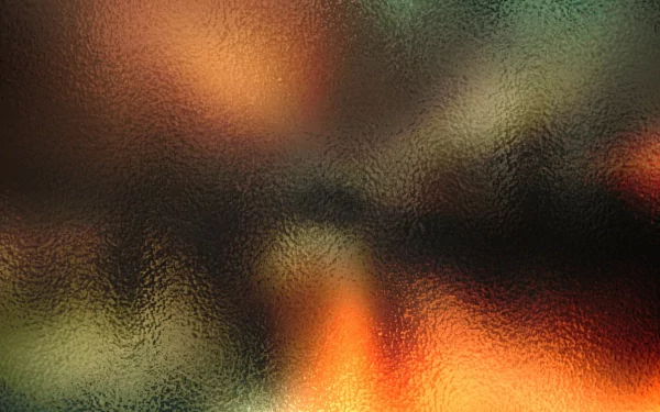 Abstract blurred colors blend smoothly in this HD PC desktop wallpaper, creating a warm and textured background with rich autumnal tones.