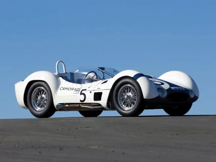 White Maserati Tipo 61 Birdcage sports car (#5) on tarmac under a clear blue sky — HD PC desktop wallpaper/background.