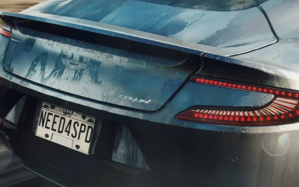 Rear close-up of a dirt-splattered blue sports car with license plate 'NEED4SPD' and glowing taillights — Need For Speed: Rivals video game HD PC desktop wallpaper and background.