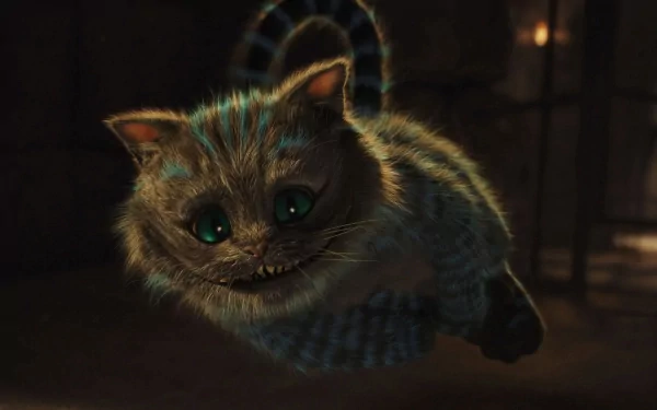 A whimsical high-definition wallpaper featuring the Cheshire Cat from the 2010 movie Alice in Wonderland, showcasing its mischievous grin and striking green eyes.
