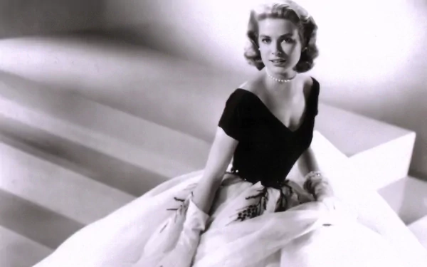 Black and white HD desktop wallpaper featuring celebrity Grace Kelly in an elegant gown, exuding classic Hollywood glamour.