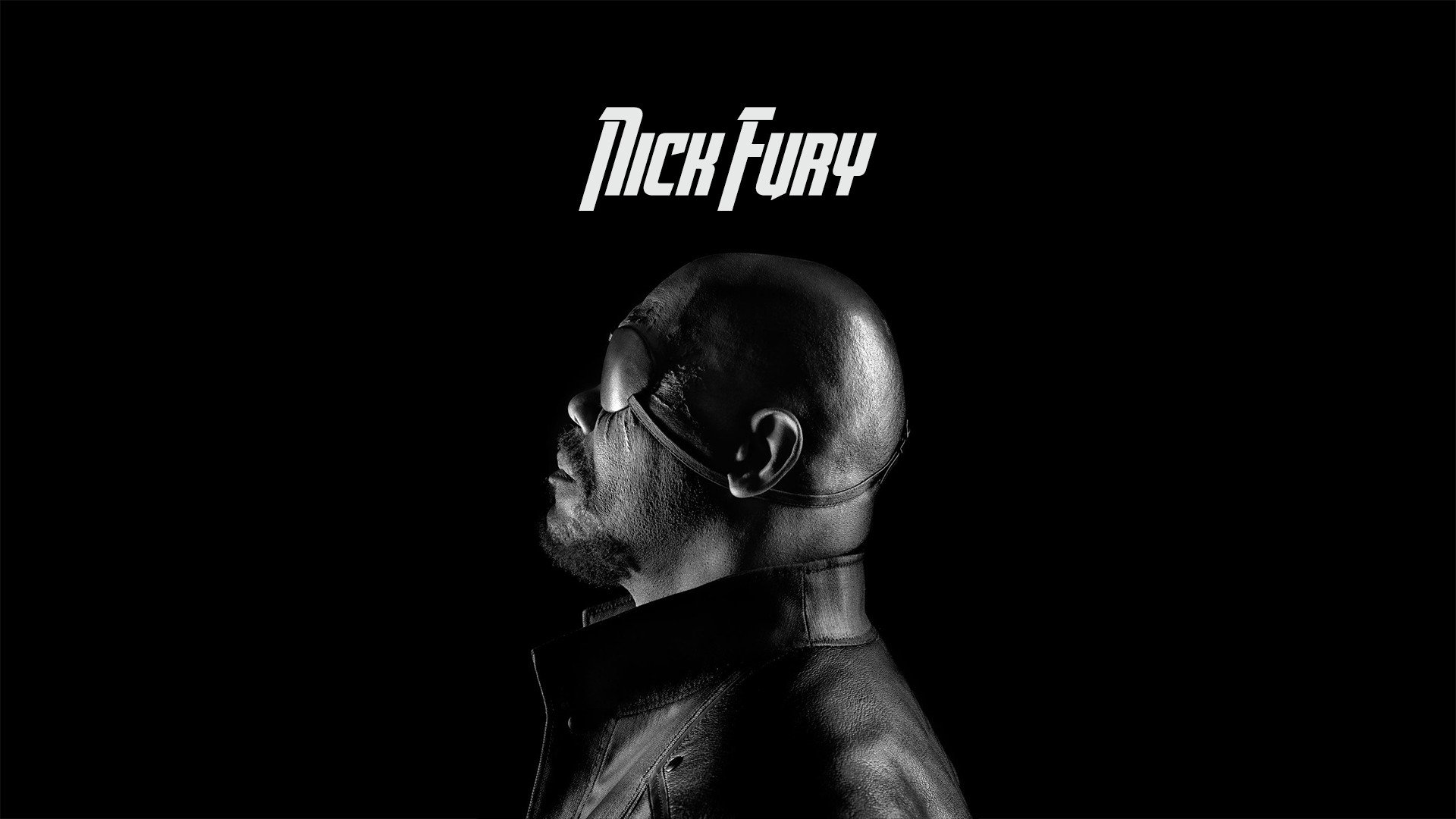 HD PC desktop wallpaper featuring a side profile of Nick Fury, portrayed by Samuel L. Jackson, from the Avengers movie series with his name in bold text above.