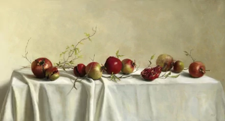 HD desktop wallpaper featuring a still life arrangement of pomegranates and branches on a draped white cloth with a soft, muted background.