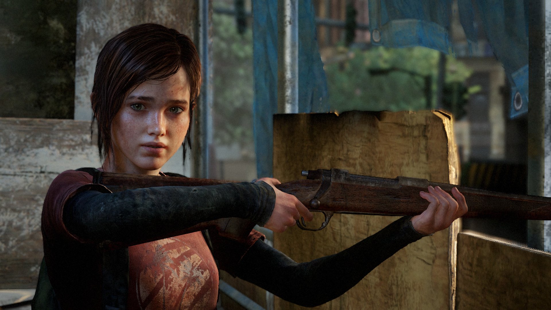 A HD desktop wallpaper from the video game The Last of Us, featuring a focused character holding a rifle, set against a backdrop of urban decay and tension.