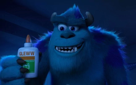 James P. Sullivan from the movie Monsters University holds a bottle of glue, showcasing his playful character in a vibrant, HD PC desktop wallpaper.