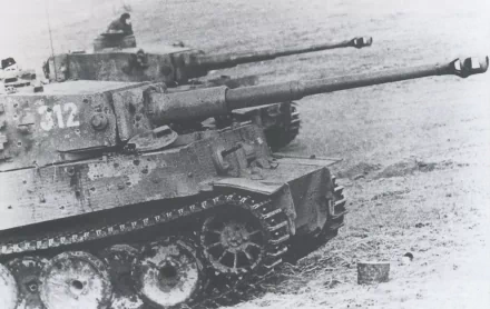 Black and white HD desktop wallpaper featuring two Tiger tanks positioned side by side on a rough terrain, showcasing military strength and historic armored vehicles.