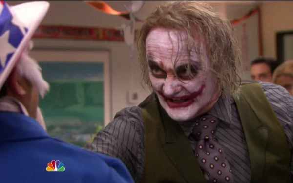 HD desktop wallpaper from The Office (US) featuring a character dressed as the Joker.