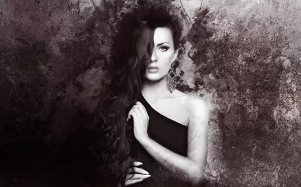 Artistic HD wallpaper featuring a woman with long hair, posed against a textured background, exuding a captivating and moody atmosphere.