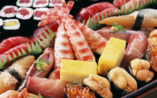 HD PC desktop wallpaper featuring a vibrant assortment of fresh seafood sushi and sashimi arranged artistically on a black platter.