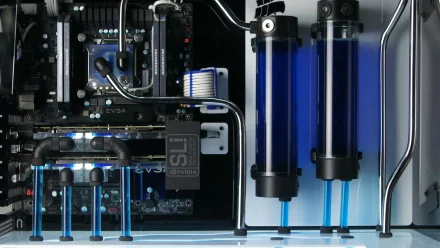 HD PC desktop wallpaper showcasing a close-up of advanced computer liquid cooling technology with blue coolant tubes and hardware components.