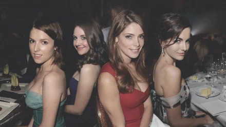 A high-definition desktop wallpaper featuring actresses Anna Kendrick, Alison Brie, Ashley Greene, and Camilla Belle at a formal event, all in elegant evening attire.
