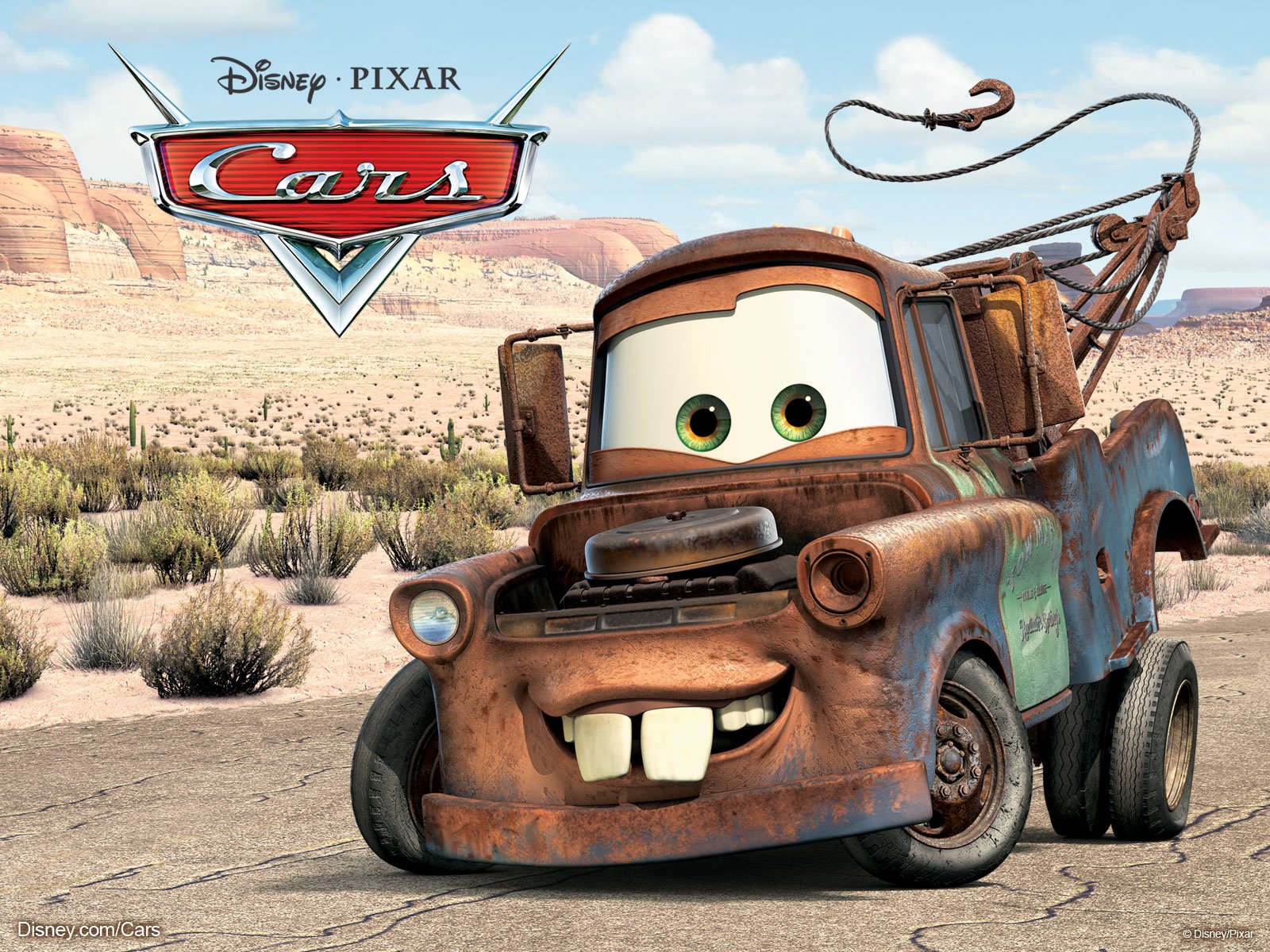 HD desktop wallpaper featuring Tow Mater, the rusty tow truck from Pixar’s movie Cars, set against a desert landscape with the Cars logo above.