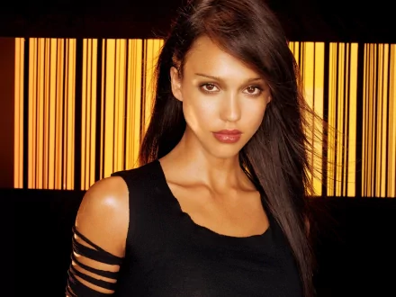 HD desktop wallpaper featuring a woman in a black top with a striking pose against a backlit golden-striped background.