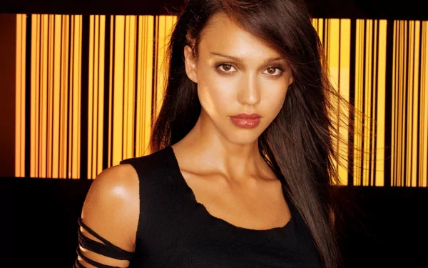 HD desktop wallpaper featuring a woman in a black top with a striking pose against a backlit golden-striped background.