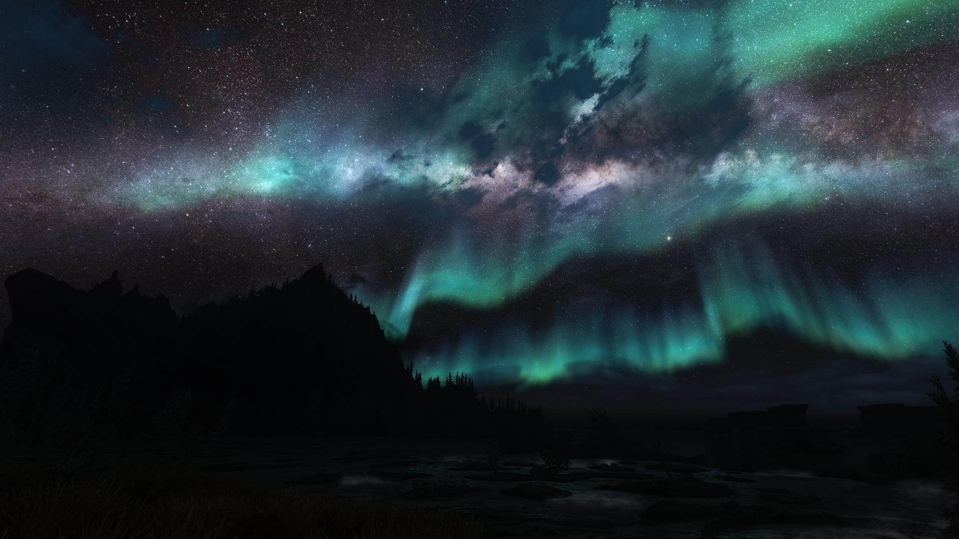 HD PC desktop wallpaper featuring a night sky with vibrant auroras and stars, inspired by the video game The Elder Scrolls V: Skyrim.
