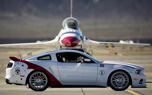 HD PC desktop wallpaper featuring a white Ford Mustang Shelby with red and black accents parked in front of a fighter jet on a runway.