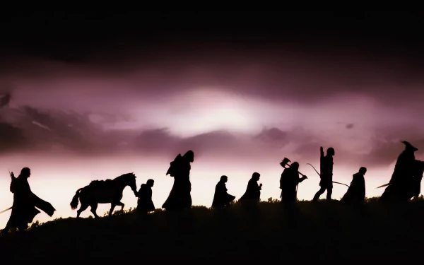 Silhouettes of the Fellowship of the Ring characters walking against a dramatic sky, captured in this HD wallpaper inspired by The Lord of the Rings: The Fellowship of the Ring.