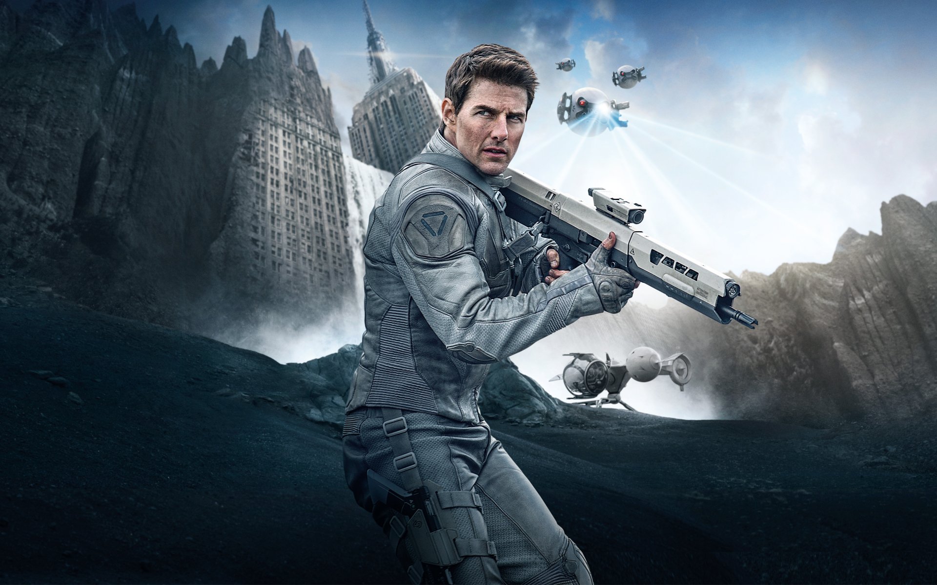 A striking HD wallpaper featuring Tom Cruise in character from the movie Oblivion, showcasing a dramatic landscape with futuristic elements and a sense of action.