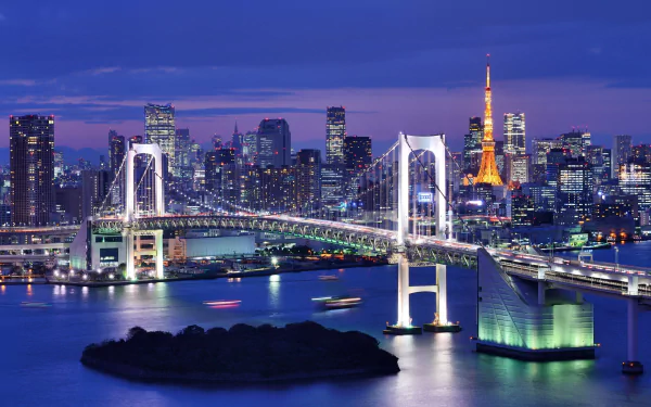 HD desktop wallpaper showing Tokyo's illuminated Rainbow Bridge and Tokyo Tower against a twilight city skyline.