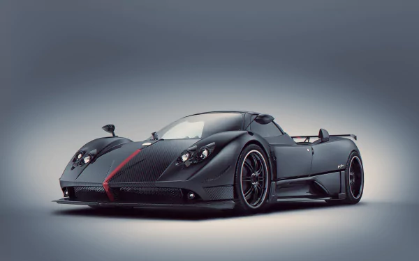 A striking Pagani Zonda showcased in an HD desktop wallpaper, featuring a sleek black design with bold red accents, emphasizing its artistic and aerodynamic features.