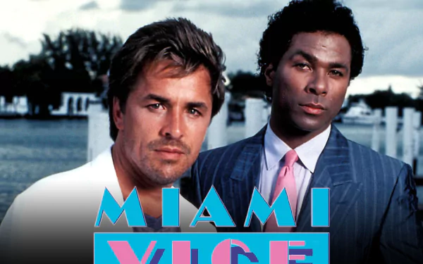 HD desktop wallpaper featuring the main characters from the TV show Miami Vice against a waterfront backdrop.