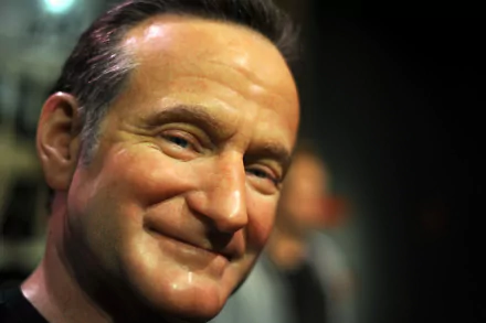 HD desktop wallpaper and background featuring a close-up image of a smiling man.