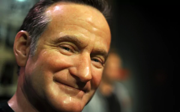 HD desktop wallpaper and background featuring a close-up image of a smiling man.