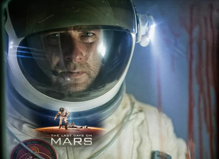 Sci-fi movie HD PC desktop wallpaper: close-up of a helmeted astronaut with reflected lights and a tiny Mars landscape — poster for The Last Days on Mars.