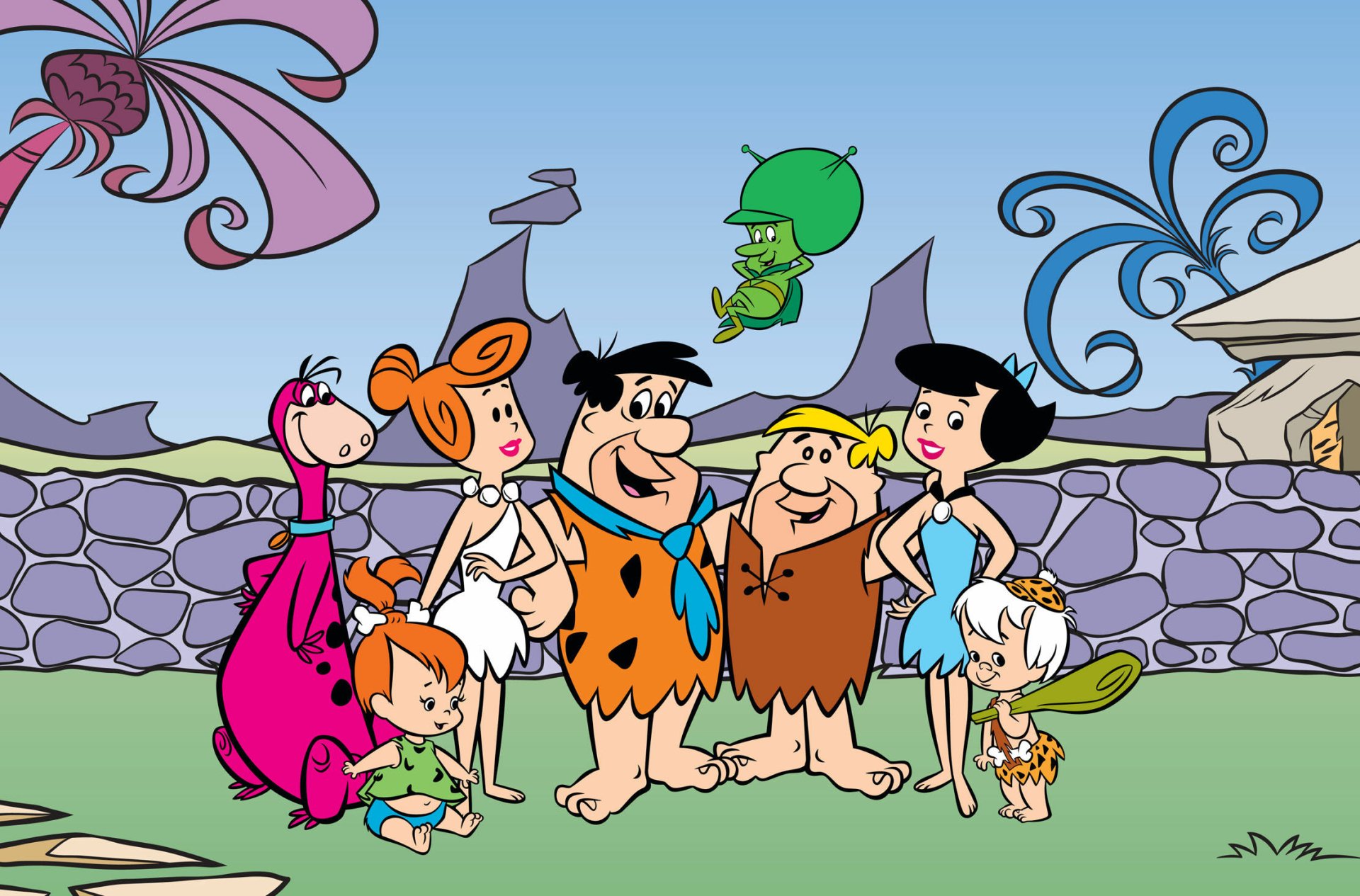 HD wallpaper featuring characters from the TV show The Flintstones, including Fred, Wilma, Barney, Betty, and their children in a vibrant prehistoric setting.