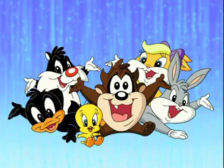 HD desktop wallpaper featuring Baby Looney Tunes characters Daffy Duck, Sylvester, Tweety, Lola Bunny, Bugs Bunny, and Tasmanian Devil against a blue background.