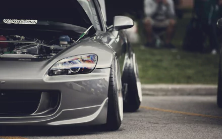 A sleek Honda S2000 showcases its aggressive stance and stylish design, making for an eye-catching HD PC desktop wallpaper and background.