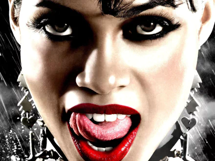 Close-up HD desktop wallpaper of Rosario Dawson from the movie Sin City, featuring bold makeup and intense expression.
