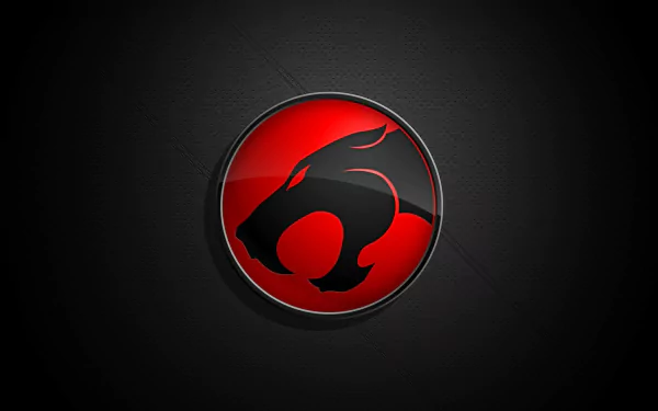 HD desktop wallpaper featuring the ThunderCats logo from the 1985 TV show, set against a textured black background.