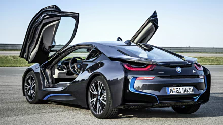 A sleek BMW i8 parked with its doors open, showcasing its aerodynamic design and modern features. This image serves as an HD desktop wallpaper and background for automotive enthusiasts.