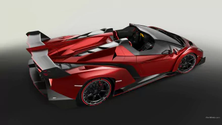 HD PC desktop wallpaper featuring a sleek red Lamborghini Veneno Roadster with aerodynamic design and sharp angles against a plain background.