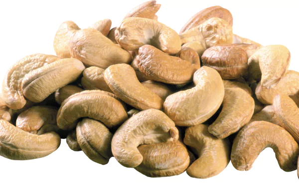 HD desktop wallpaper featuring a close-up of whole cashew nuts, highlighting their smooth texture and natural beige color.