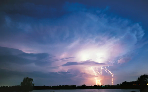 A stunning HD desktop wallpaper featuring dramatic lightning in the sky, perfect for adding an electrifying touch to your computer background.