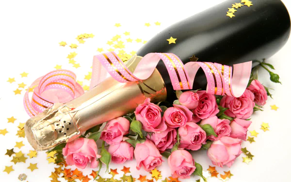 A romantic arrangement featuring a bottle of champagne nestled among pink roses, adorned with ribbons and gold star confetti, creating an elegant HD wallpaper for any setting.