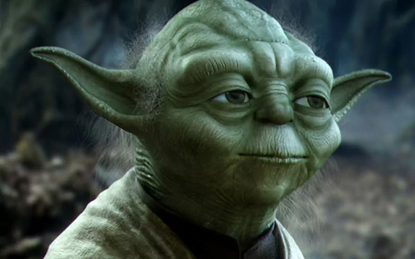 HD desktop wallpaper featuring Jedi Master Yoda from Star Wars set against a dark background.