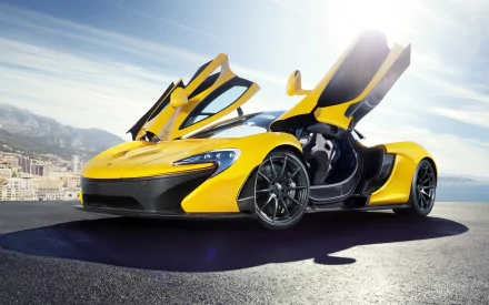 A striking yellow McLaren P1 supercar stands with its doors open, showcasing its sleek design against a bright backdrop, showcasing its impressive engineering and style.
