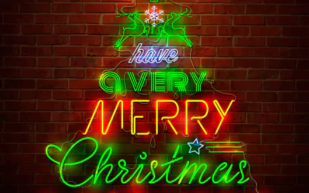 HD PC desktop wallpaper featuring a neon sign shaped like a Christmas tree with Have a Very Merry Christmas glowing against a brick wall, celebrating the holiday season.