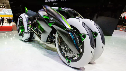 A sleek Kawasaki Electric J motorcycle with an innovative design featuring unique white wheels, showcased as a vibrant 4K Ultra HD PC desktop wallpaper.
