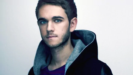 HD PC desktop wallpaper featuring a close-up portrait of DJ Zedd with a focused expression, blending music and modern style.
