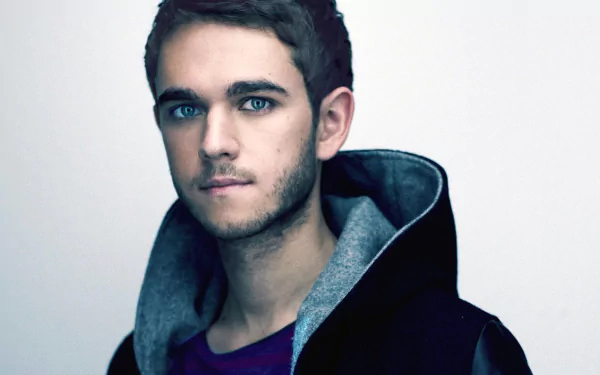 HD PC desktop wallpaper featuring a close-up portrait of DJ Zedd with a focused expression, blending music and modern style.