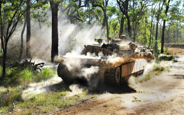 M1A1 Abrams tank maneuvers through a dusty forest trail in this HD military-themed desktop wallpaper.
