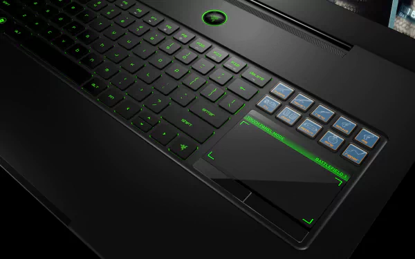 A close-up of a sleek laptop keyboard featuring a modern design with green backlighting, showcasing the intersection of technology and user experience in a high-definition wallpaper.