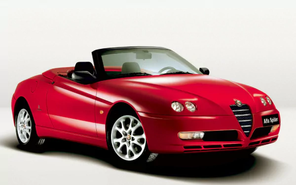 Red Alfa Romeo GTV Spider convertible sports vehicle on a white background — HD PC desktop wallpaper and background